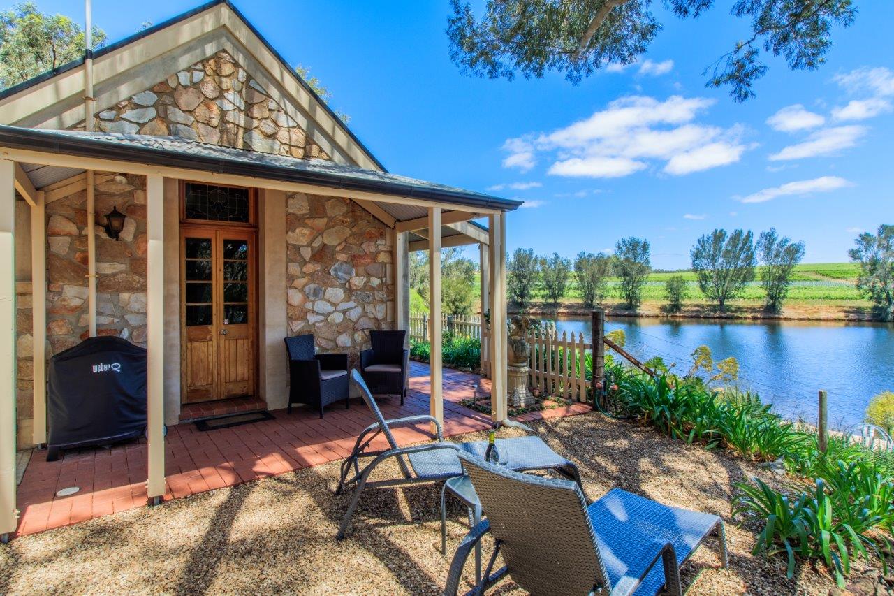 Cupid's Cottage - outdoor patio with idyllic lake views Cupid's Cottage - outdoor patio with idyllic lake views